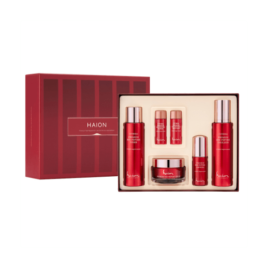 Caja de regalo abierta mostrando el set completo de 4 productos y 2 mini tallas de la línea antiedad HAION Premium Red Peptide.